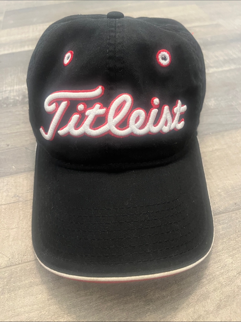 Titleist Black Cap with White and Red Script Logo